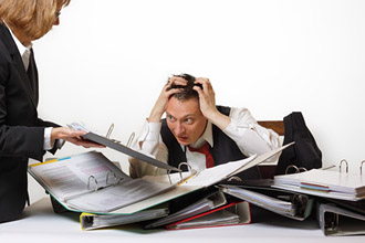 Die Arbeitsbelastung sorgt für Stress bei der Arbeit, wie der Stressreport 2012 zeigt